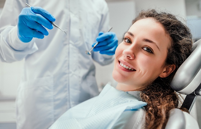 A patient receiving a dental checkup in Studio City