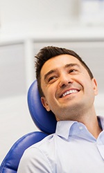 Man smiling in the dental chair