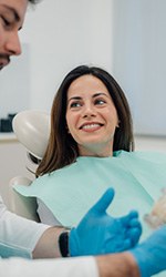 Woman smiling at the dentist