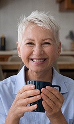 Woman drinking a cup of coffee