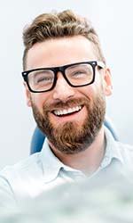 Young man enjoying his new dental implants in Studio City