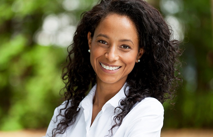 Woman with beautiful smile outdoors