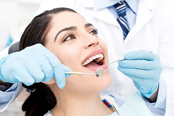 woman smiling in dental chair