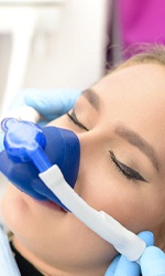 Woman undergoing nitrous oxide sedation in Studio City