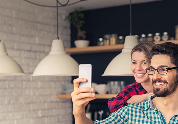 Man and woman taking selfie