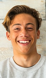Male teenager smiling