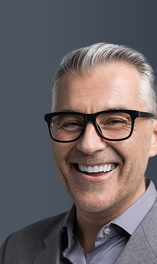 Older man with attractive smile and glasses