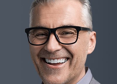 Older man with attractive smile and glasses