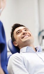 Man smiling at dentist in Studio City during smile makeover consultation