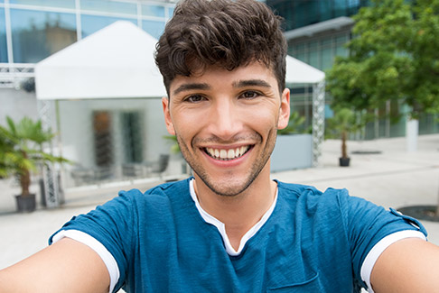 Young man with straight teeth