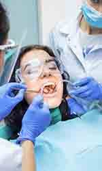 Woman getting a dental procedure