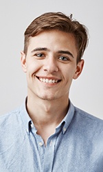 a man smiling with veneers in Studio City