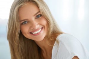 woman smiling with perfectly straight teeth