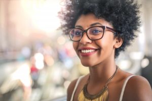 pretty woman curly hair smiling