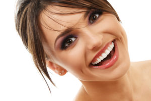woman brunette smiling with perfect teeth