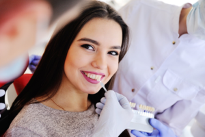 a person visiting their dentist for veneers